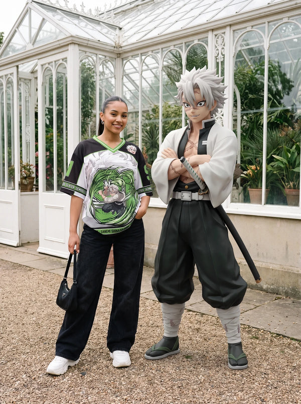 Woman wearing the Sanemi Shinazugawa green anime football jersey